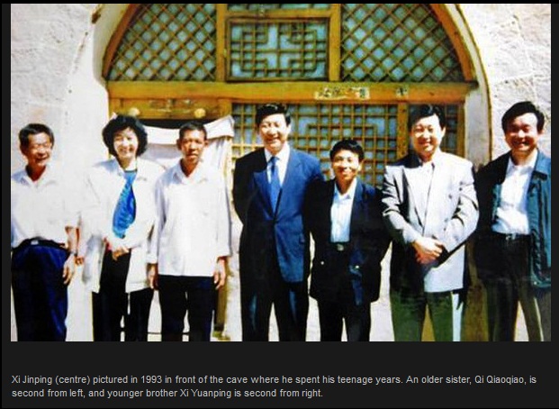 Xi Jinping centre pictured in 1993 in front of the cave where he spent his teenage years