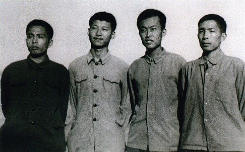 Xi second left as an educated youth volunteer in 1973
