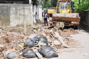 ගංවතුර කසළ මේ සතිය තුළ සම්පූර්ණයෙන් ඉවතට